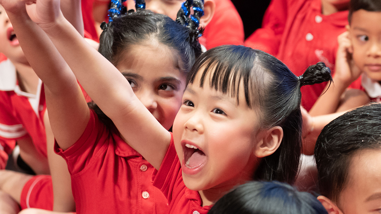 Image 1: https://mindchamps-prod-wp.s3.ap-southeast-1.amazonaws.com/wp-content/uploads/2020/03/13195300/girl-cheering-on-stage-1280x720-1.jpg